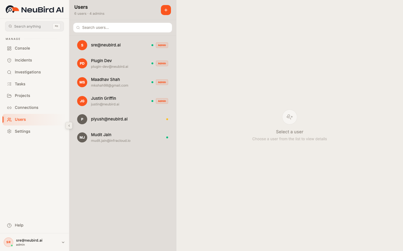 Users page showing a table of team members with roles and status